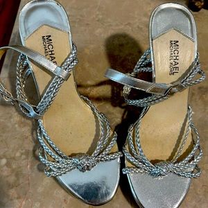 Micheal Kors Silver wedge platform with cork heel. Size 9.